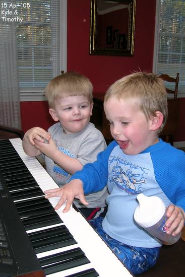 Kyle and Timothy jammin' on the piano