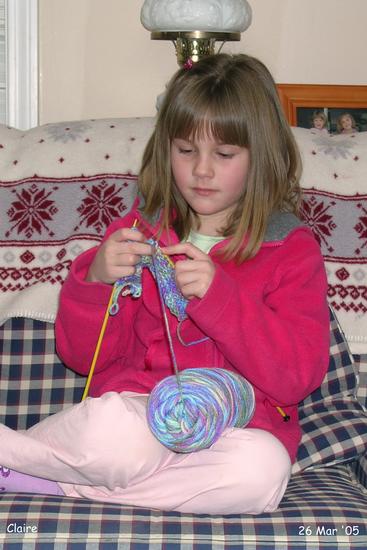 Claire is learning to knit