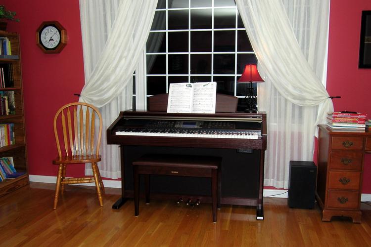 Piano replaces the couch in the study