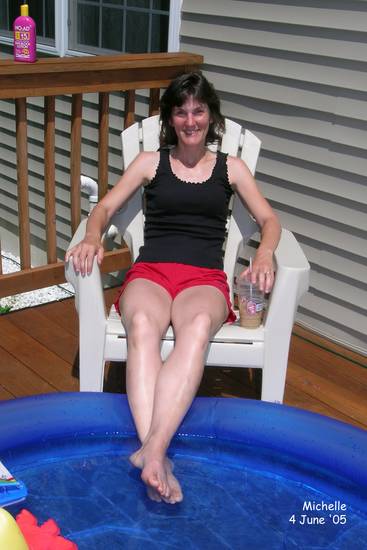 Michelle relaxing by the kiddie pool