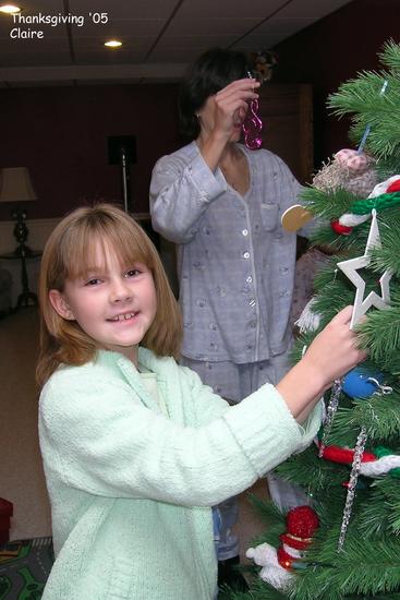 Claire trims the tree