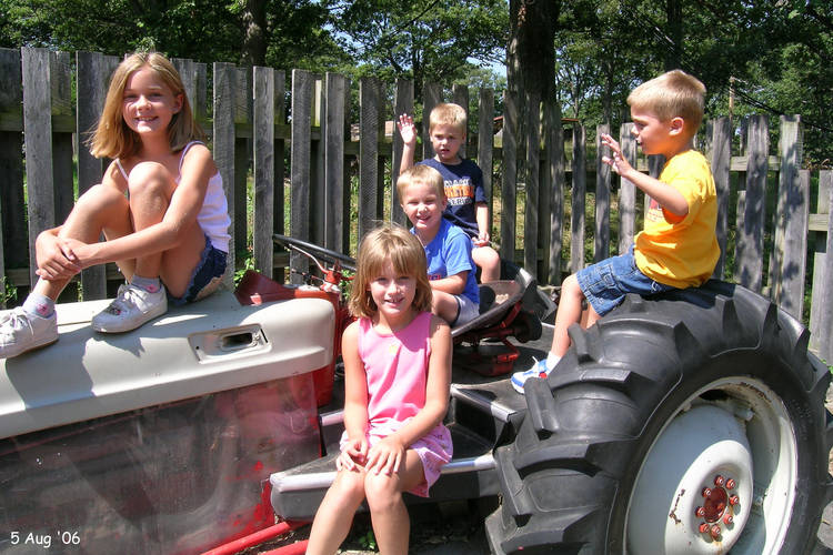 Kids on a tractor (at the zoo)