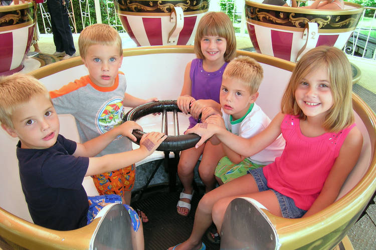 Daniel, Timothy, Abigail, Michael, and Claire in the teacups