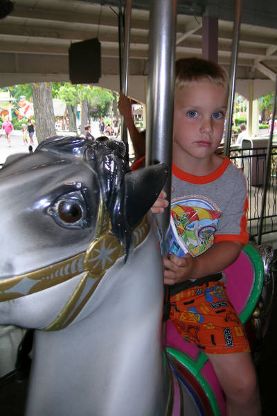 Timothy is not so sure about this Carousel ride