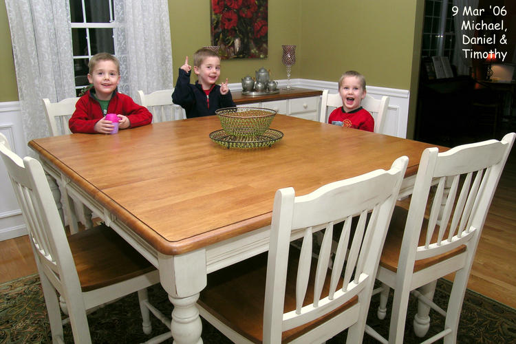 Michael, Daniel, and Timothy check out the new table