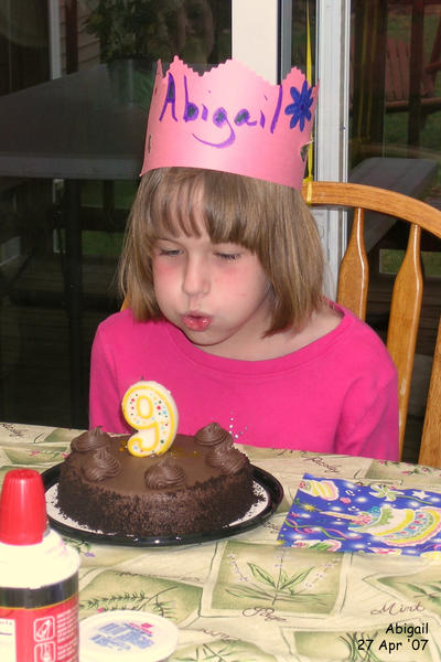 Abigail blowing out the candle