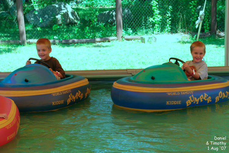 Daniel and Timothy on bumper boats