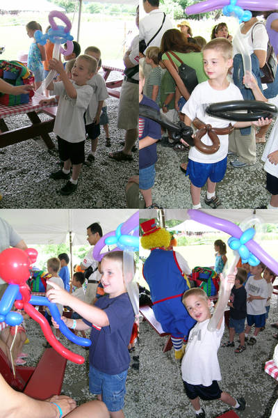 The boys having balloons made at Kimball Farm