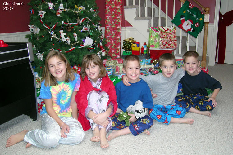 The kids on Christmas morning, waiting to open gifts