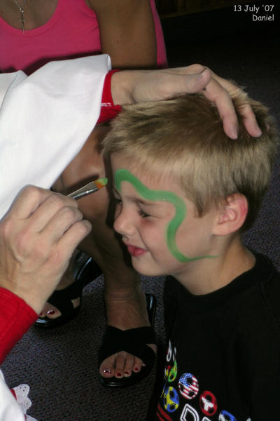 Daniel getting his face painted