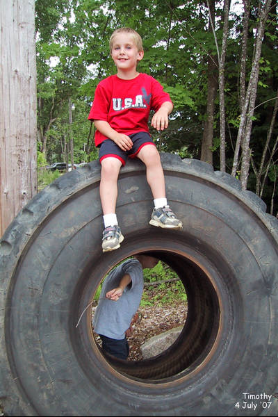 Timothy on a tractor tire