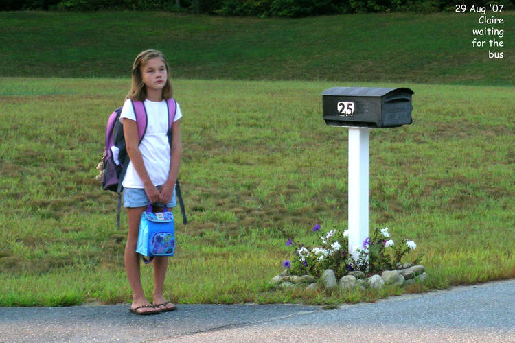 Claire waiting for the school bus
