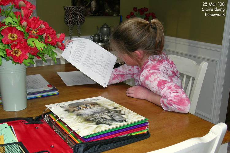 Claire working on her homework