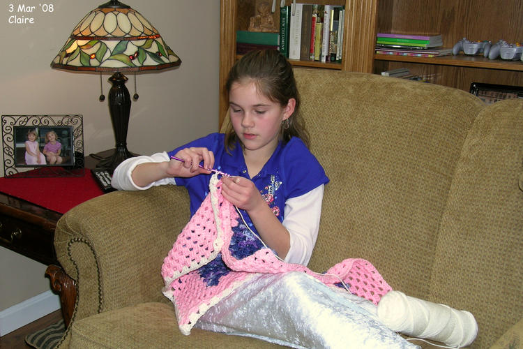 Claire working on a blanket