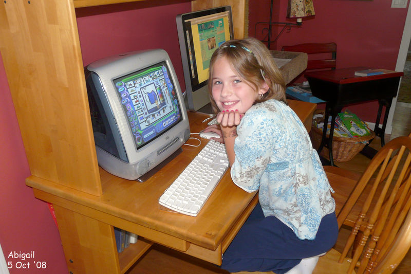 Abigail running KidPix on the ol' iMac