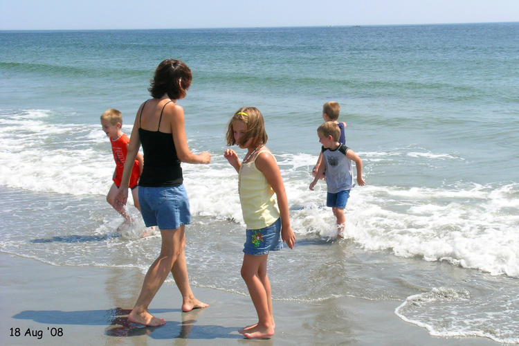 Michelle and the kids at the coast