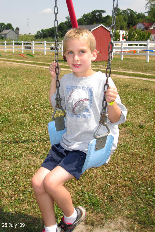 Timothy on a swing