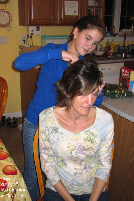 Claire cutting Michelles hair