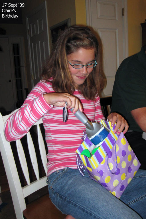 Claire opening presents on her birthday
