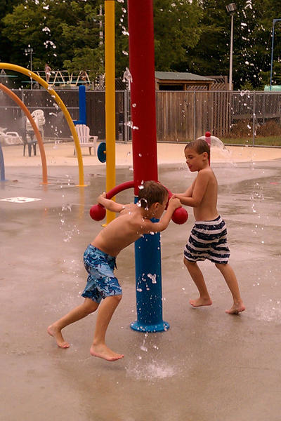 The twins enjoying Forest Park Aquatic Center