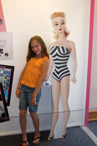Abigail with a classic Barbie