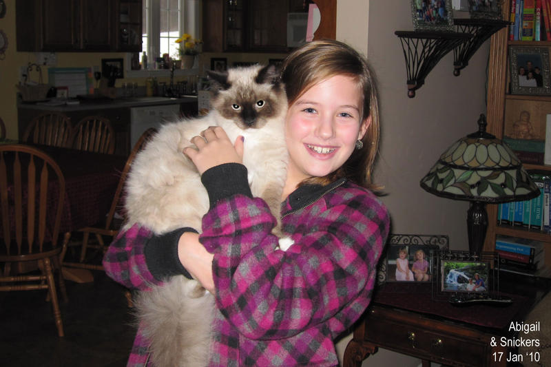 Abigail holding Snickers