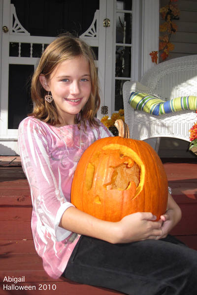 Abby with her pumpkin