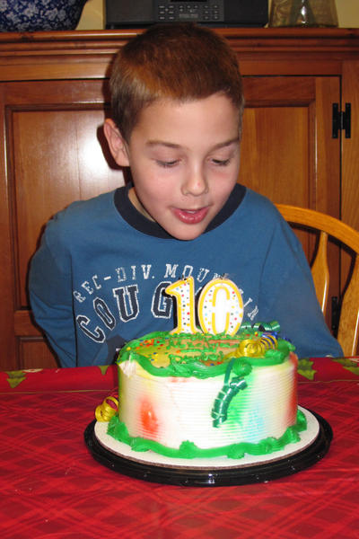 Daniel blowing out his candle