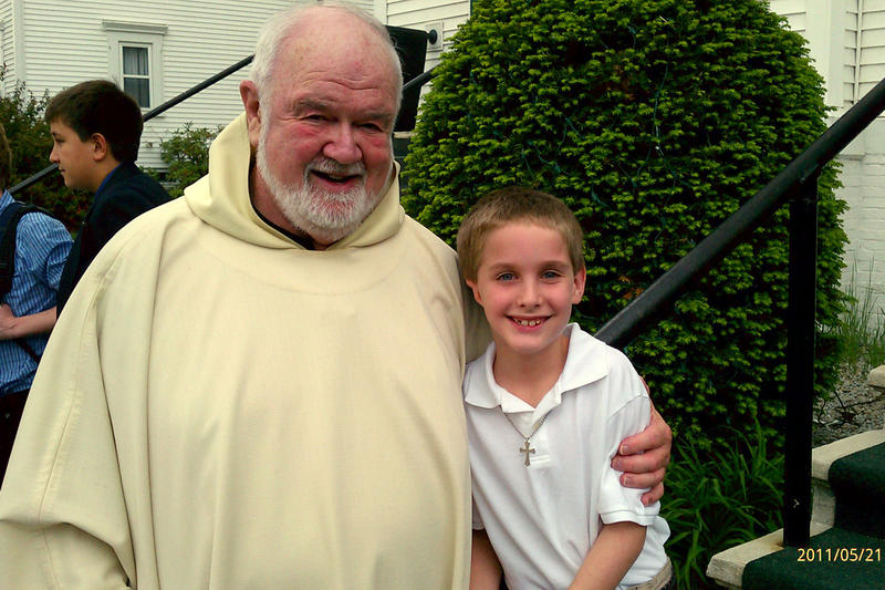 Father Don and Timothy after Timothy's 1st Communion